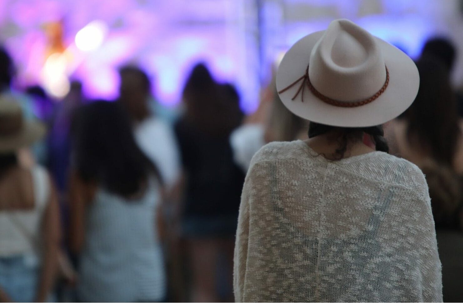 a woman watching a concert