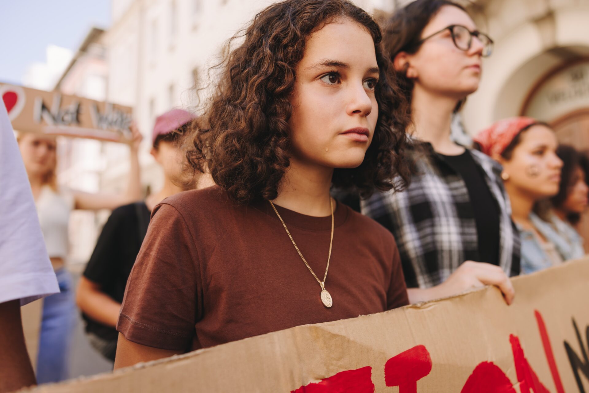 Diverse,Young,People,Protesting,Against,War,And,Violence,In,The